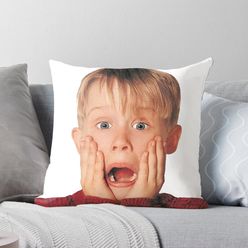 A decorative pillow featuring the iconic "Ahh!" scream of Kevin McCallister from the Home Alone movie.