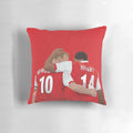 Thierry Henry and Dennis Bergkamp, two renowned Arsenal FC football legends, featured on a decorative pillow.