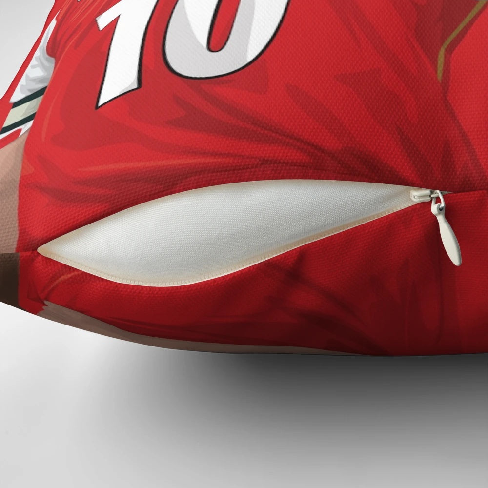 Thierry Henry and Dennis Bergkamp, two renowned Arsenal FC football legends, featured on a decorative pillow.