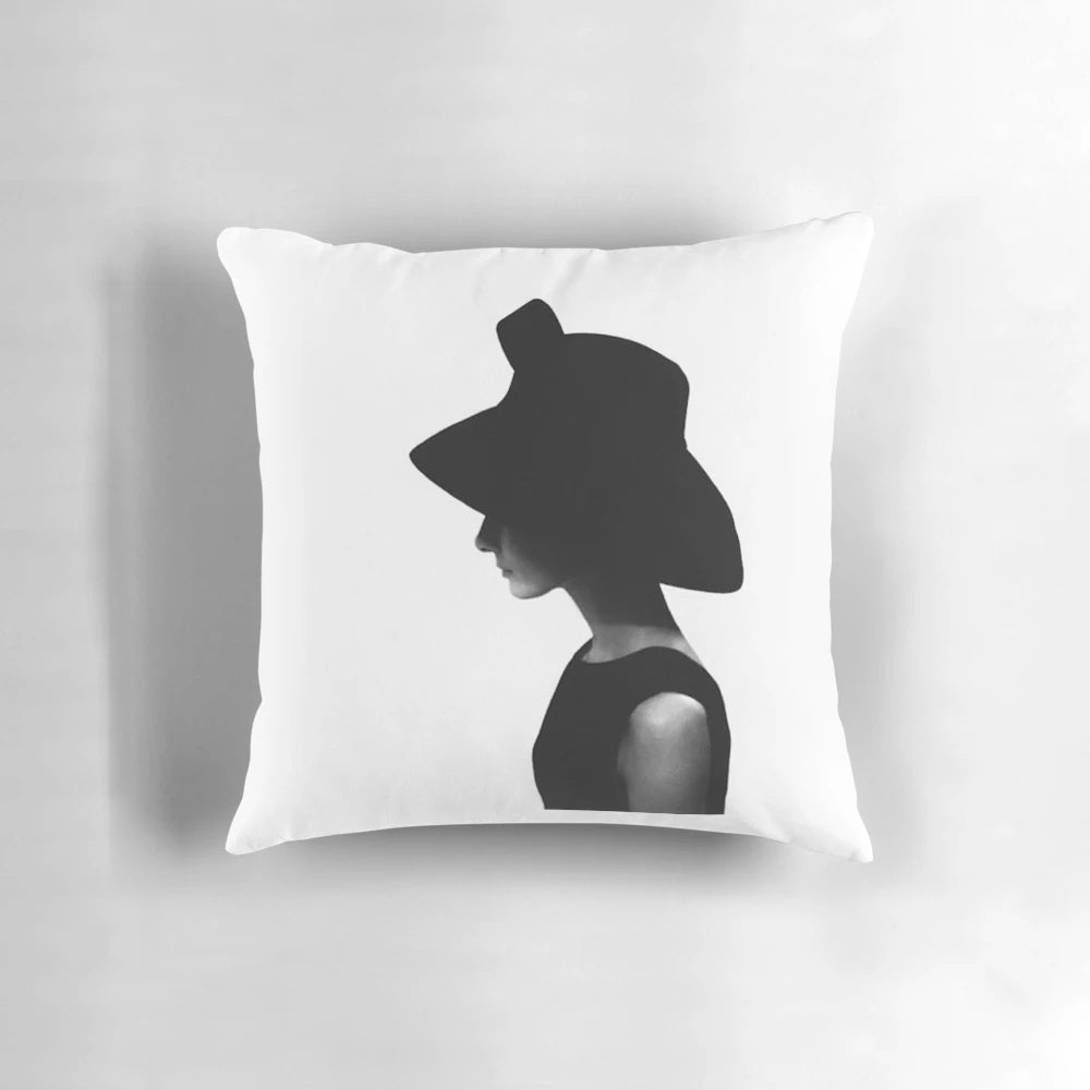 Elegant, black-and-white portrait of Audrey Hepburn printed on a plush, high-quality pillow for timeless Hollywood glamour.