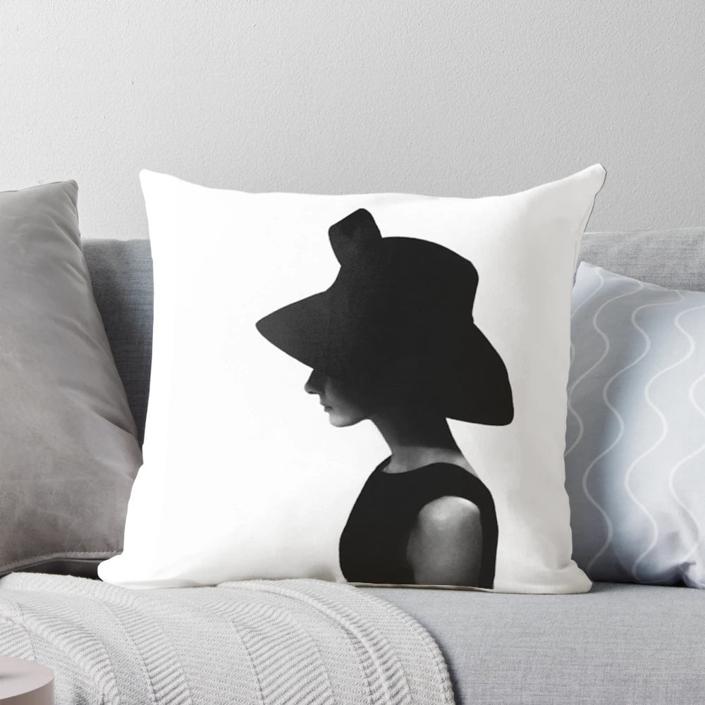 Elegant, black-and-white portrait of Audrey Hepburn printed on a plush, high-quality pillow for timeless Hollywood glamour.