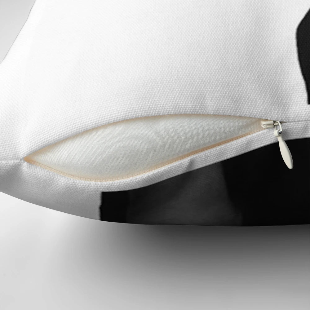 Elegant, black-and-white portrait of Audrey Hepburn printed on a plush, high-quality pillow for timeless Hollywood glamour.