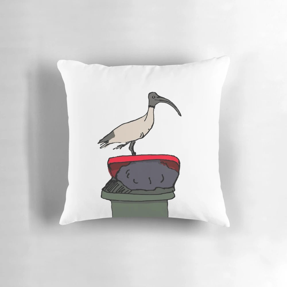 Decorative pillow featuring an illustration of the iconic Australian bin chicken or ibis scavenging in the city streets.