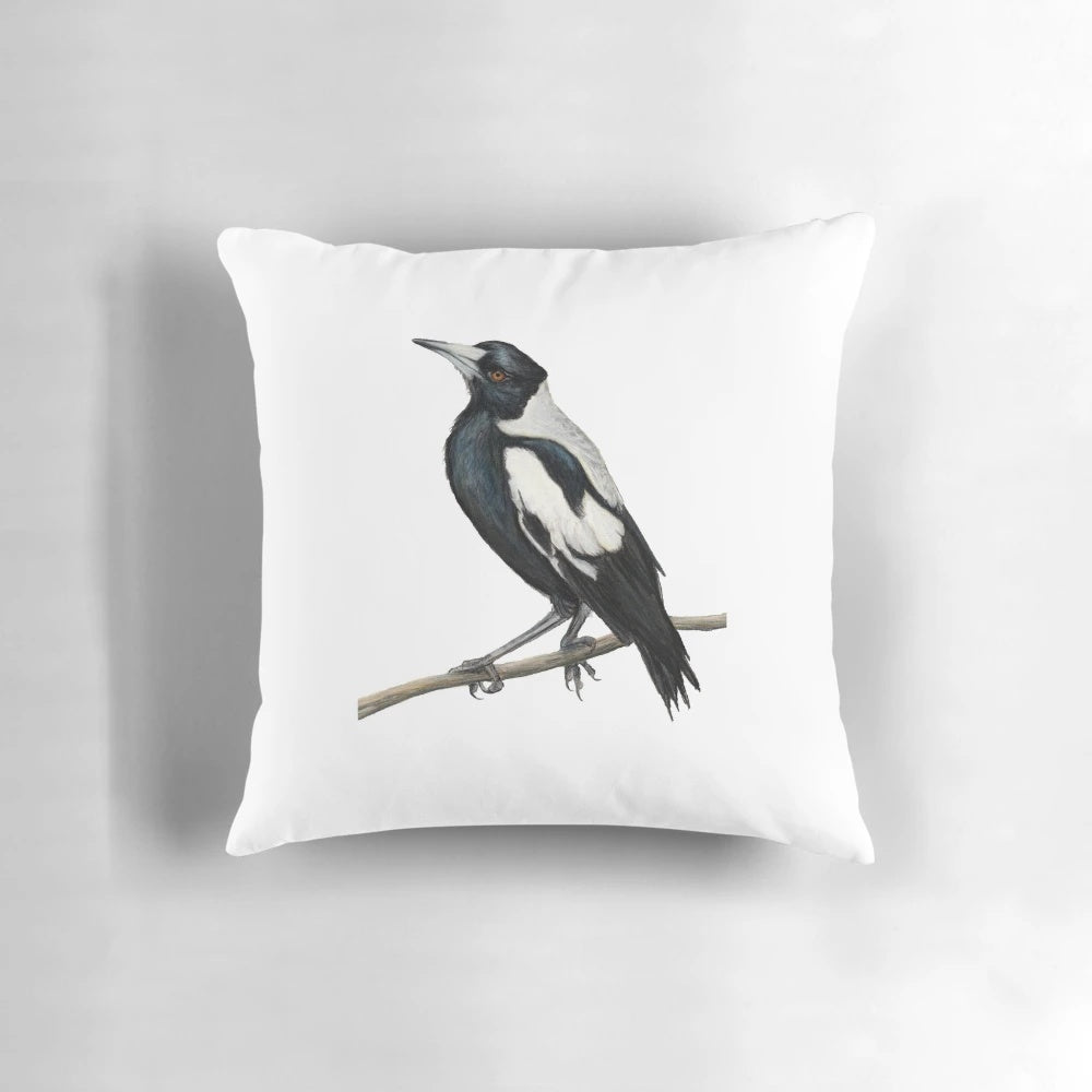 Decorative pillow featuring a hand-drawn illustration of the iconic Australian magpie, a beloved symbol of the Collingwood football club.