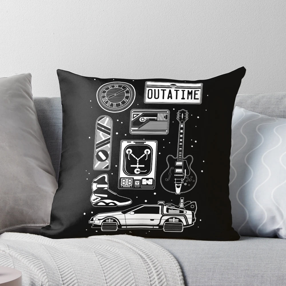 Pillow with minimalist Back to the Future icons including the DeLorean, flux capacitor, and hoverboard