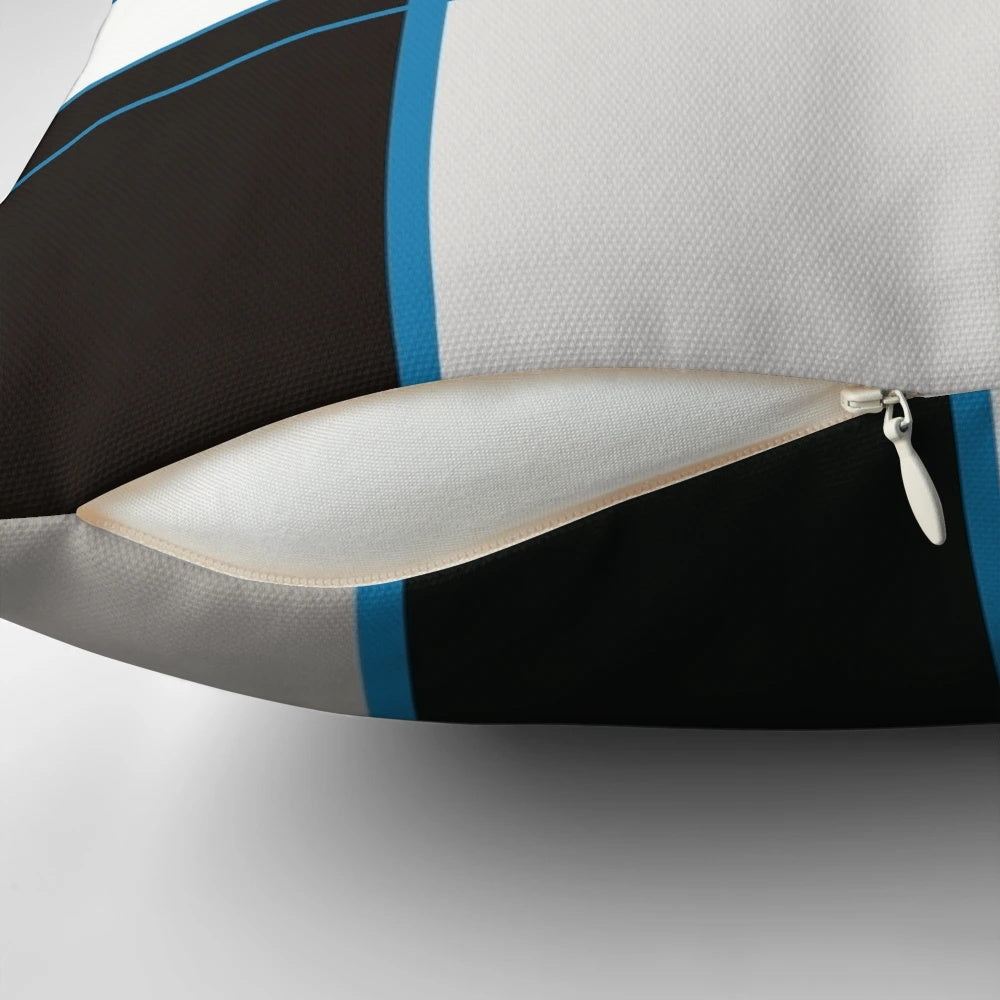 Bauhaus-inspired pillow with abstract blue, grey, and yellow geometric design