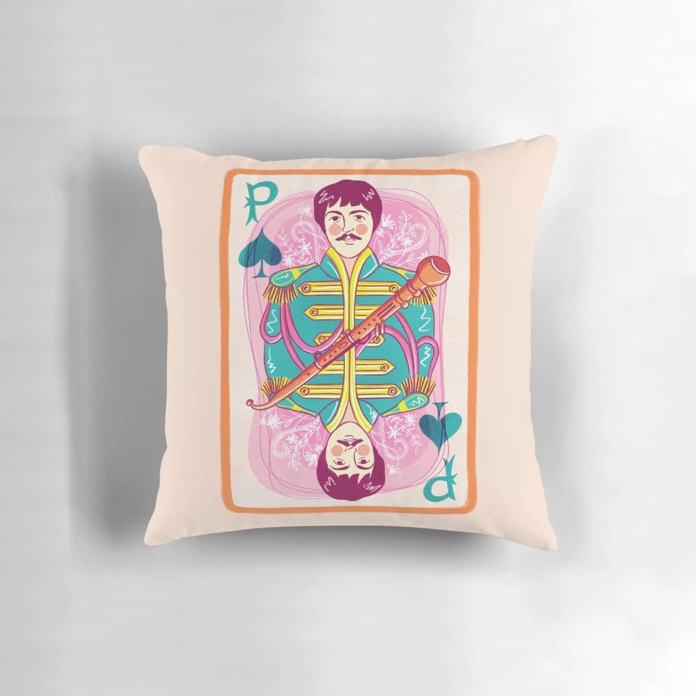 A vintage-style pillow featuring a portrait of Beatles legend Paul McCartney