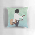 Plush Bob Marley themed pillow with vibrant reggae imagery and lyrics