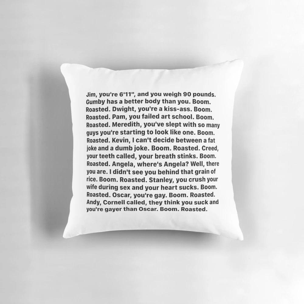 A pillow featuring the iconic "Boom Roasted" quote from the character Michael Scott in the TV show The Office.