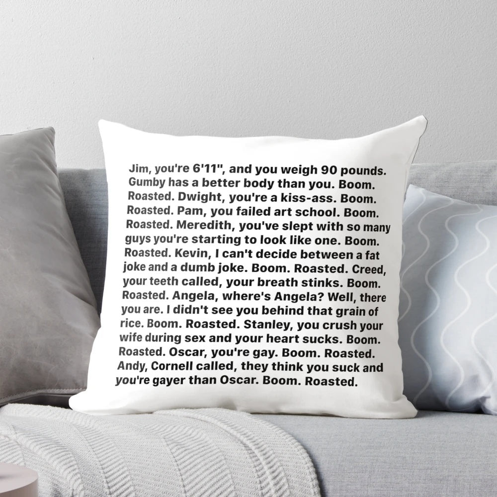 A pillow featuring the iconic "Boom Roasted" quote from the character Michael Scott in the TV show The Office.