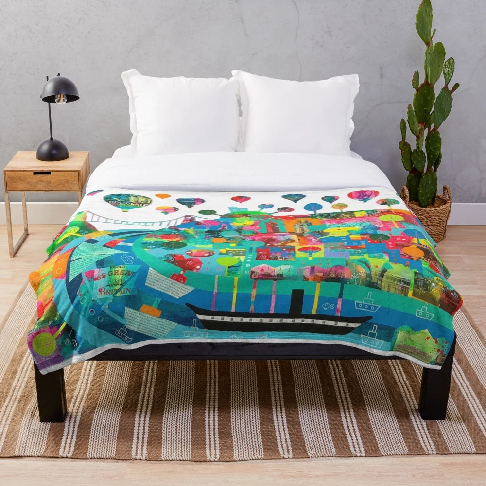 Plush blanket with images of Bristol landmarks like Clifton Suspension Bridge and SS Great Britain
