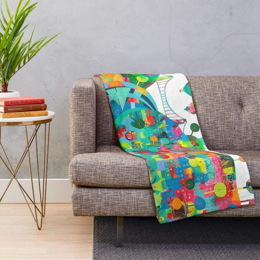 Plush blanket with images of Bristol landmarks like Clifton Suspension Bridge and SS Great Britain