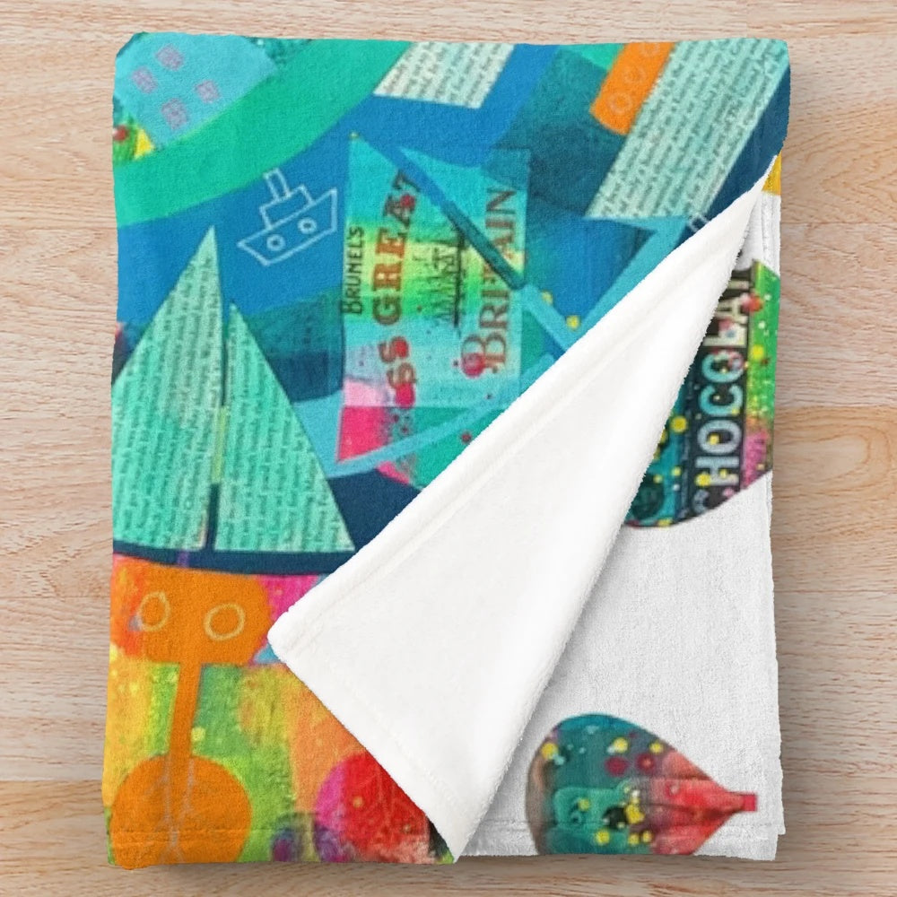 Plush blanket with images of Bristol landmarks like Clifton Suspension Bridge and SS Great Britain