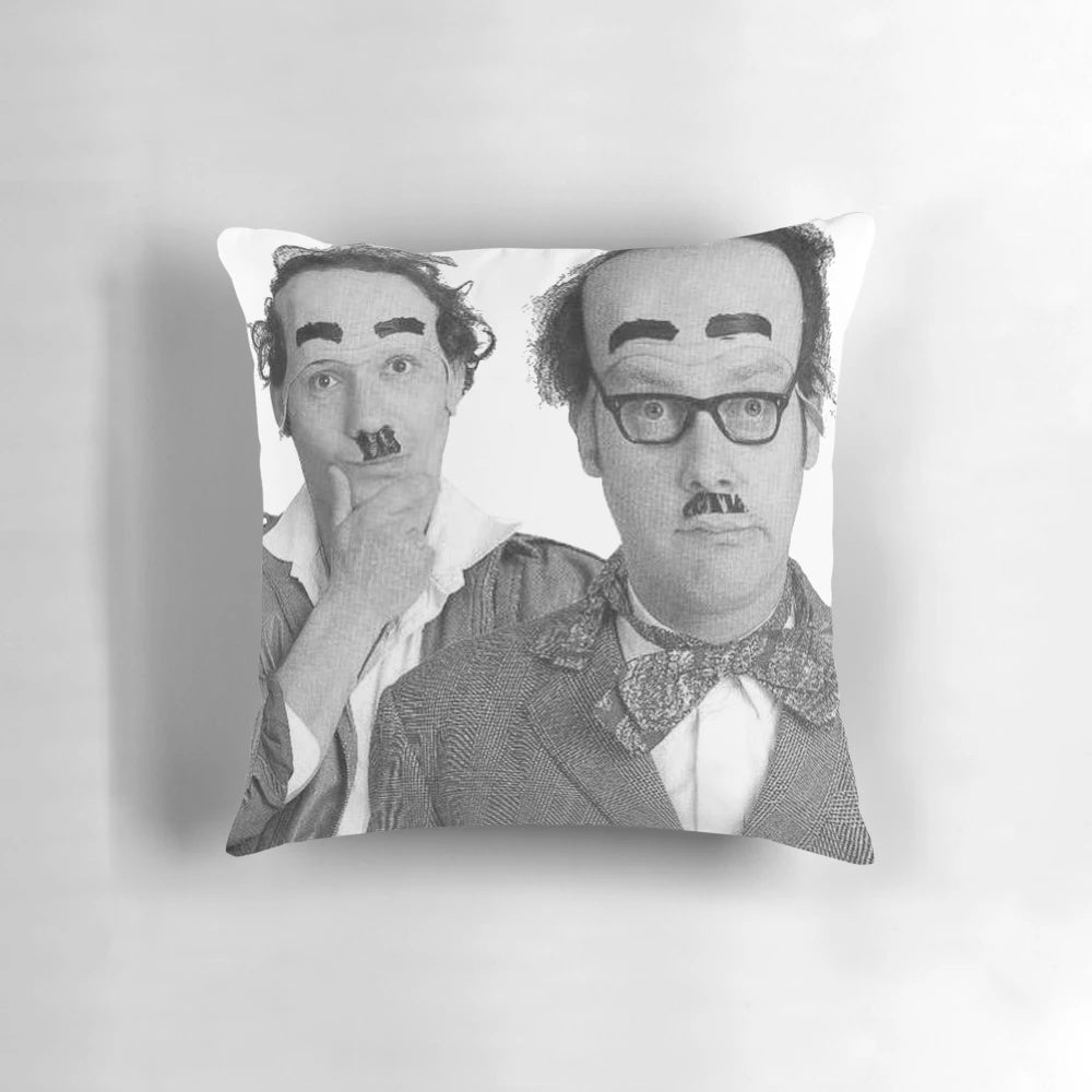 Black and white photograph of British comedy legends Donald and Davy Stott on a pillow.