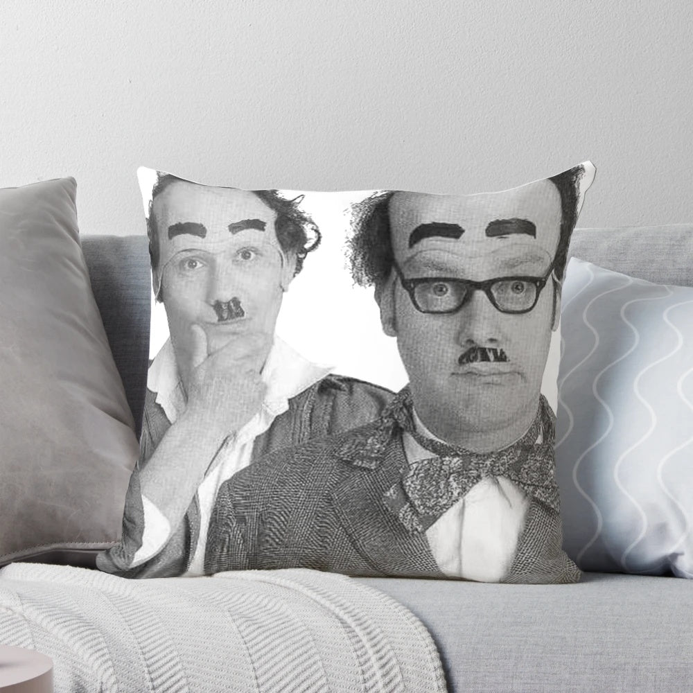 Black and white photograph of British comedy legends Donald and Davy Stott on a pillow.