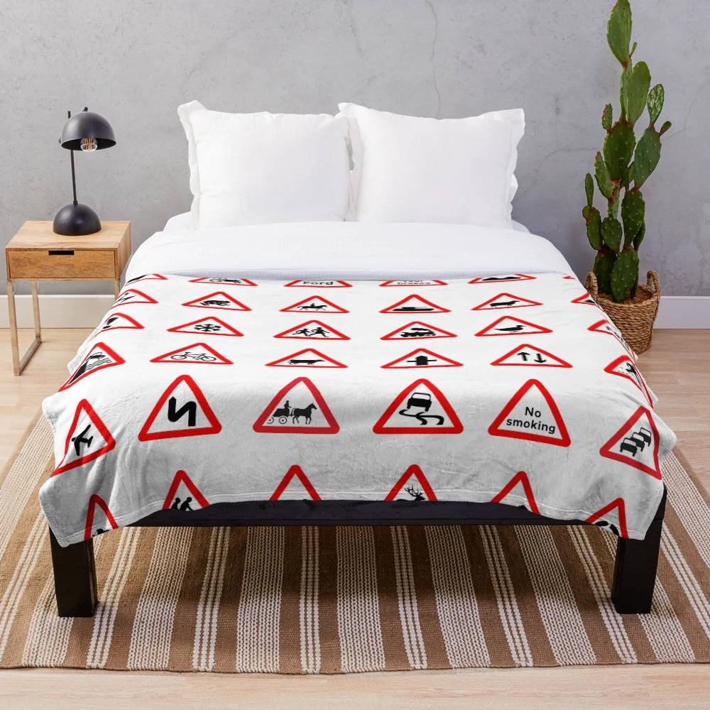Plush blanket featuring iconic British road signs