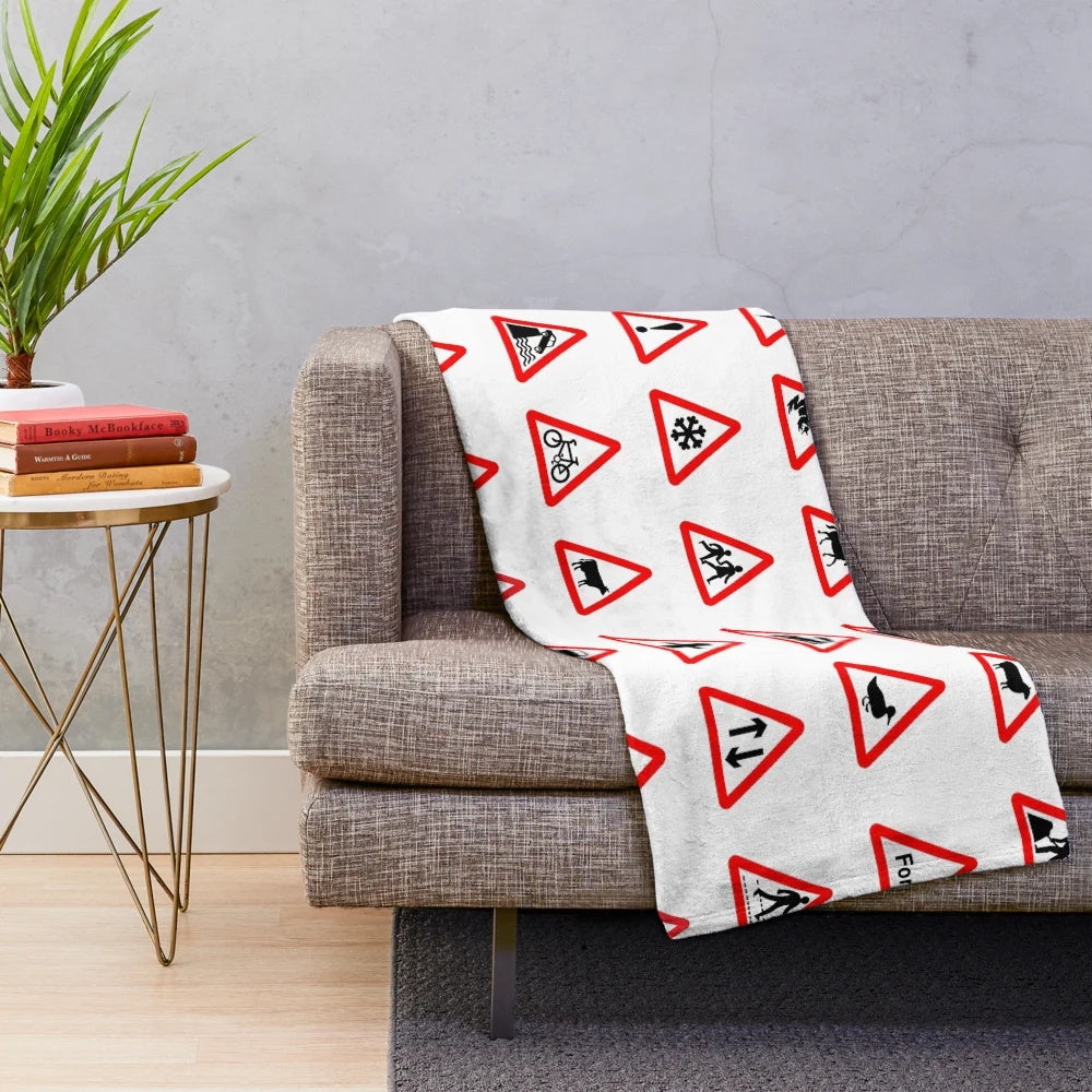 Plush blanket featuring iconic British road signs
