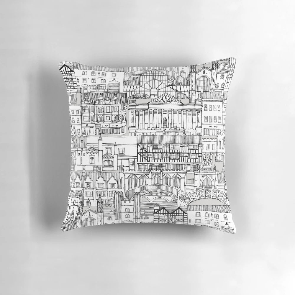 Cambridge toile mono pillow featuring black and white architectural patterns of Cambridge University buildings, churches, and landmarks