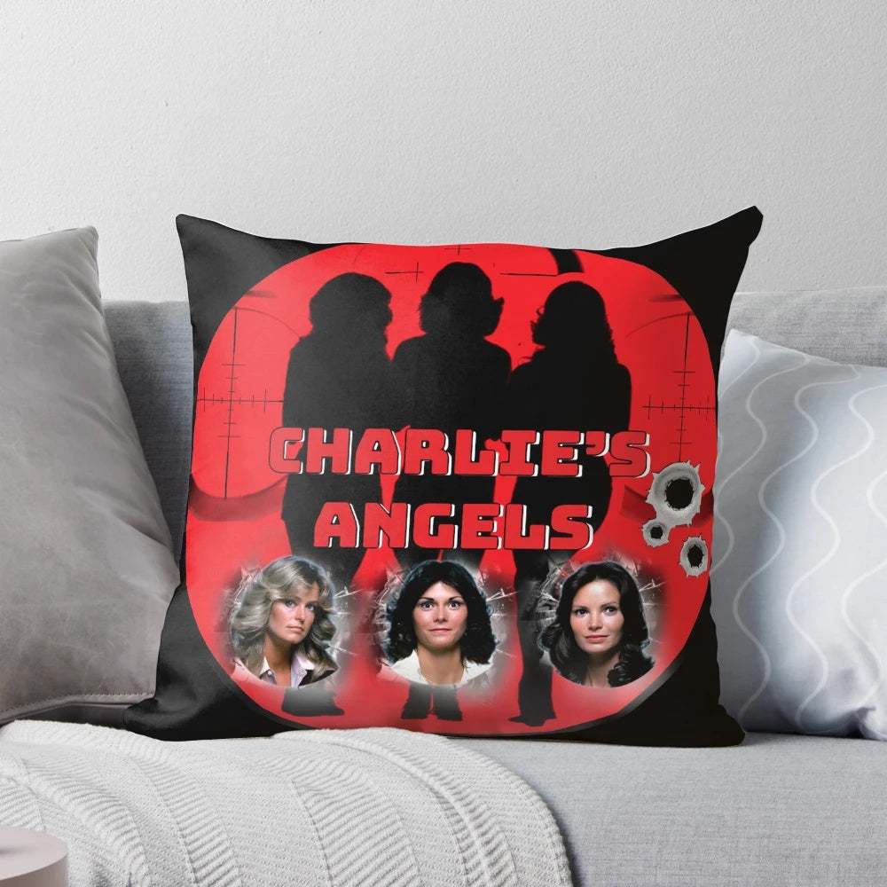 Vibrant "Charlie's Angels" themed throw pillow featuring the iconic trio of lady detectives from the classic 1970s and 1980s television series.