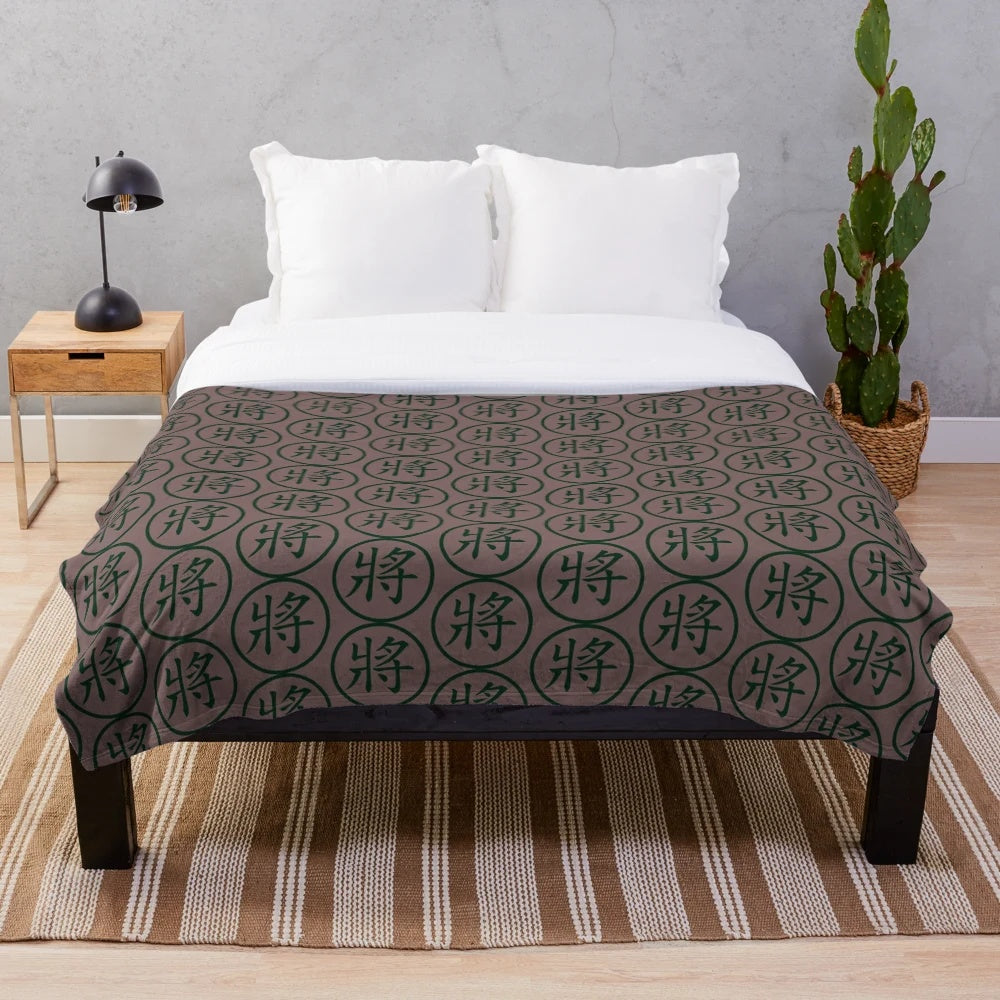 Plush blanket featuring the iconic Chinese chess piece design