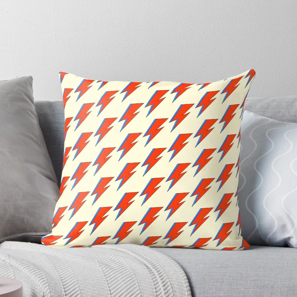 "A decorative pillow featuring the iconic lightning bolt design from David Bowie's Aladdin Sane album cover"