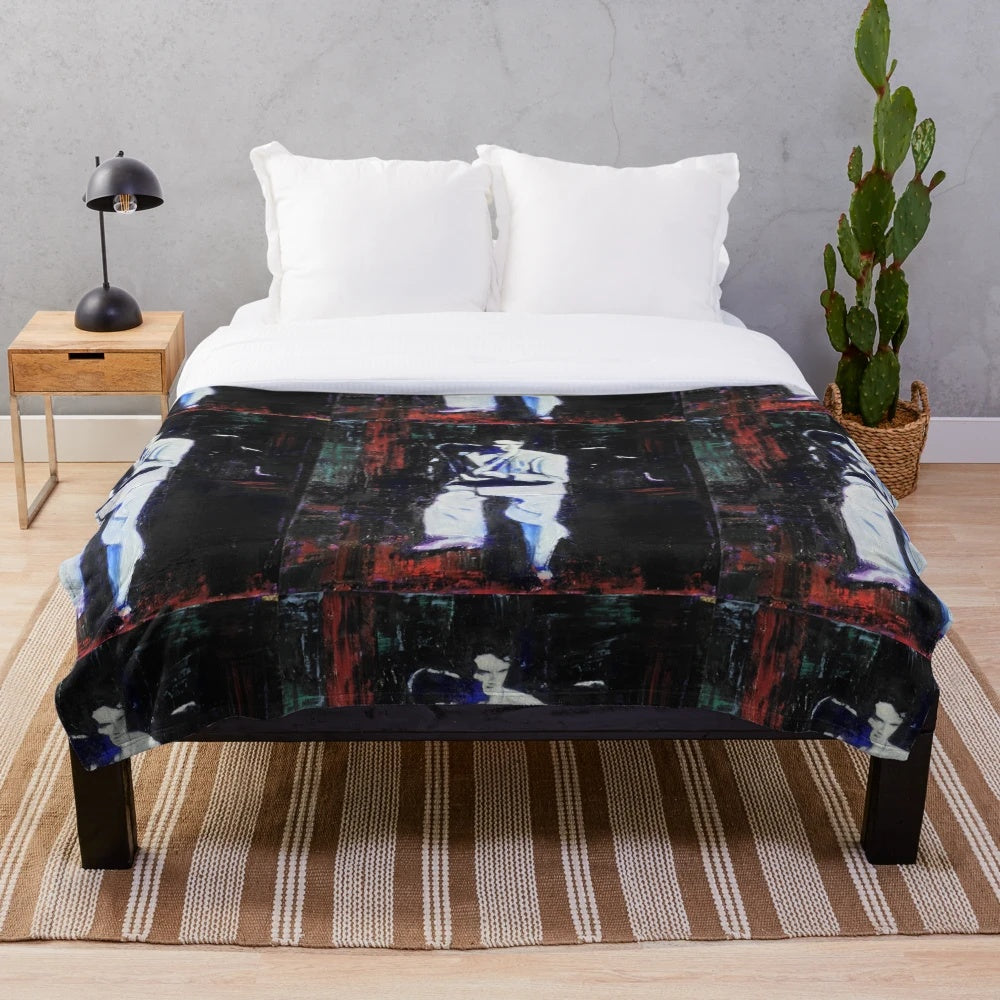 Plush blanket featuring a portrait of David Byrne, the iconic lead singer of the new wave band Talking Heads