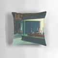 Reproduction of Edward Hopper's famous "Nighthawks" painting on a decorative pillow