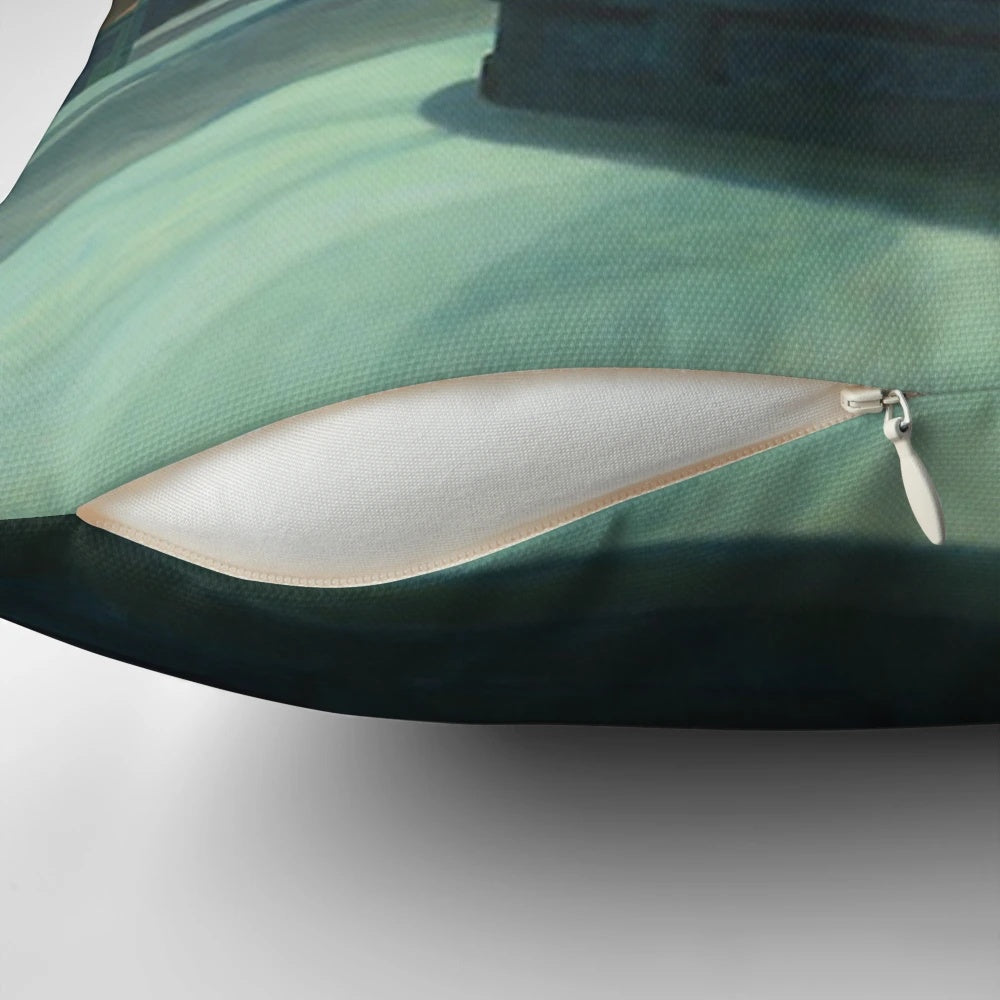 Reproduction of Edward Hopper's famous "Nighthawks" painting on a decorative pillow