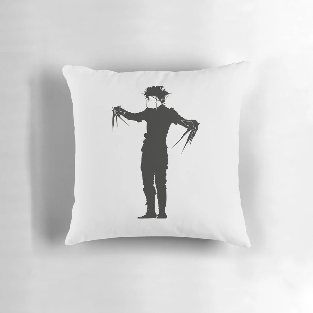 Minimalist white pillow featuring the iconic character Edward Scissorhands from the 1990s cult classic film.