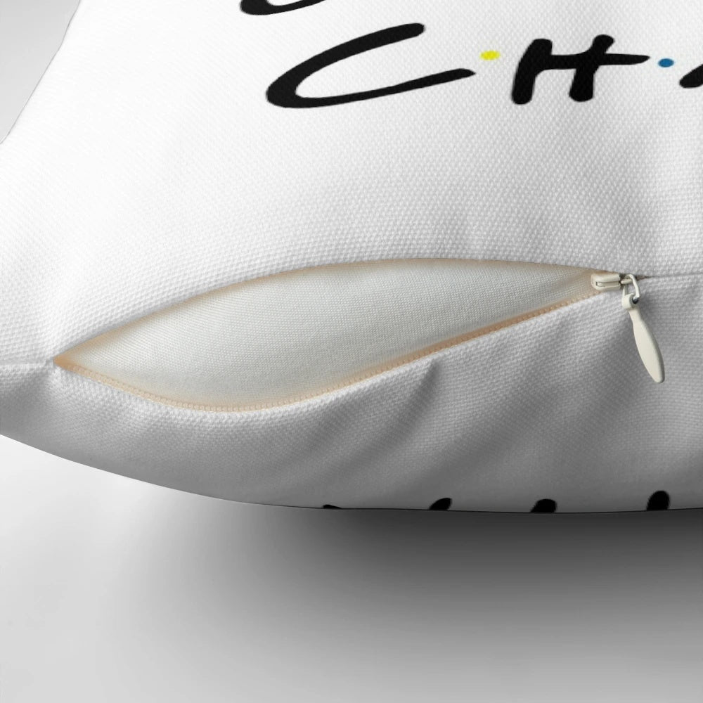 Plush pillow featuring the iconic chair from the TV show Friends, with the essence of the show's style.