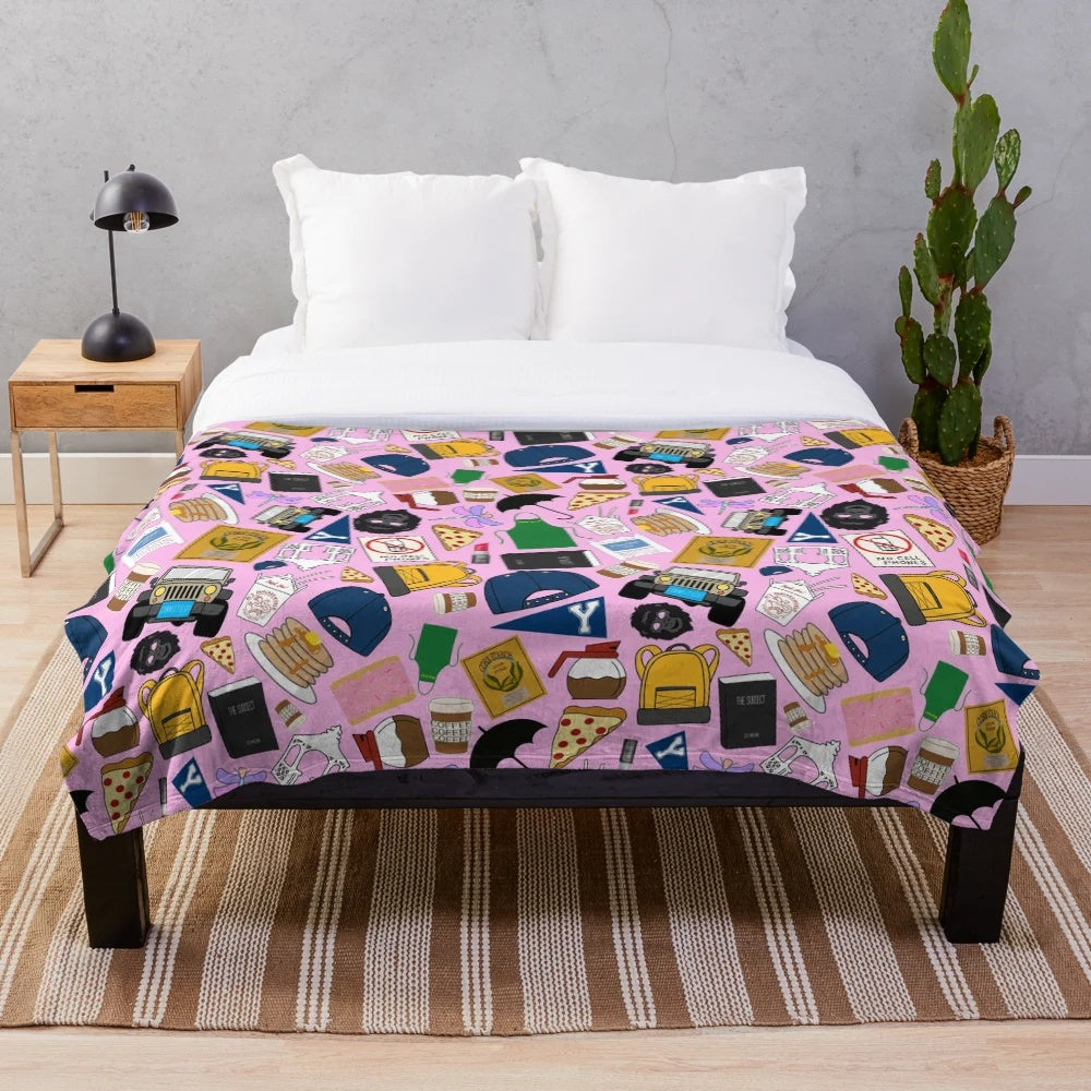 Iconic Gilmore Girls pattern printed on a soft and cozy pink plush blanket