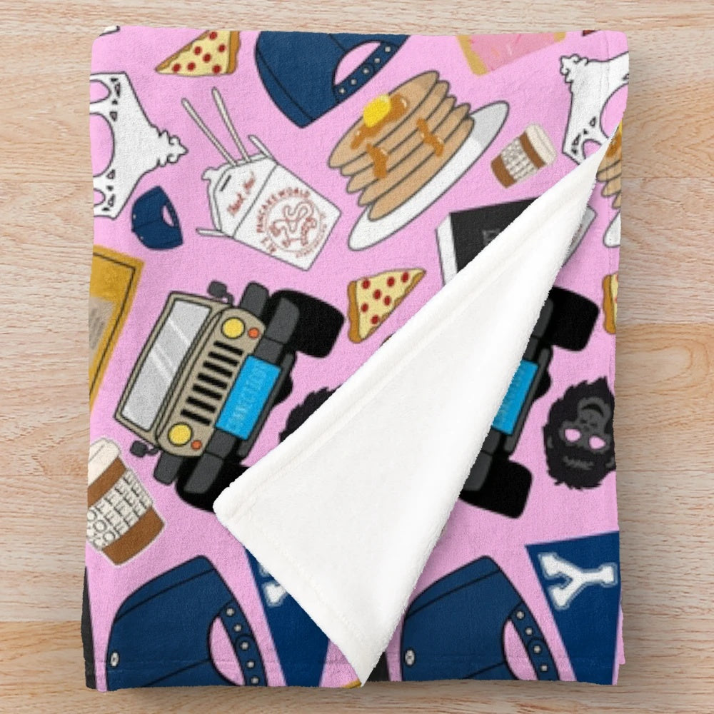 Iconic Gilmore Girls pattern printed on a soft and cozy pink plush blanket