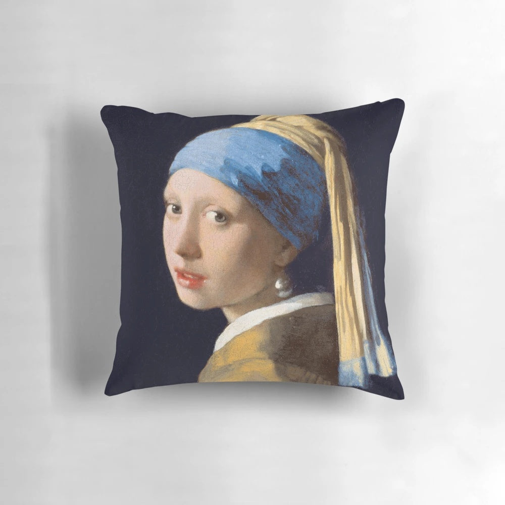 Decorative pillow featuring the famous painting "Girl With A Pearl Earring" by renowned Dutch artist Johannes Vermeer.