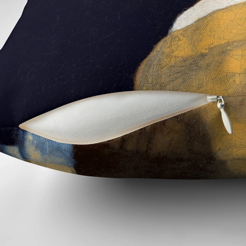 Decorative pillow featuring the famous painting "Girl With A Pearl Earring" by renowned Dutch artist Johannes Vermeer.