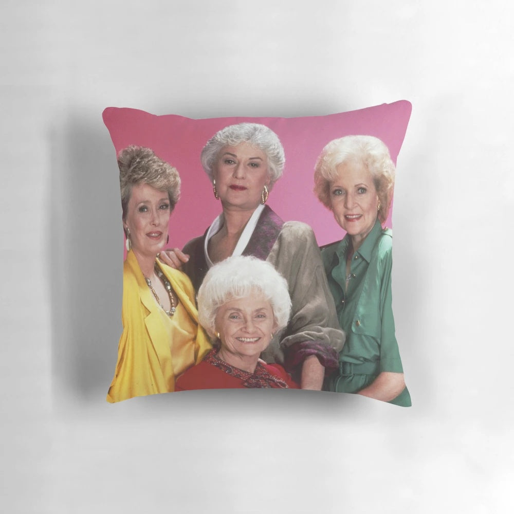 A plush pillow featuring the iconic Golden Girls characters in a metal band parody design.