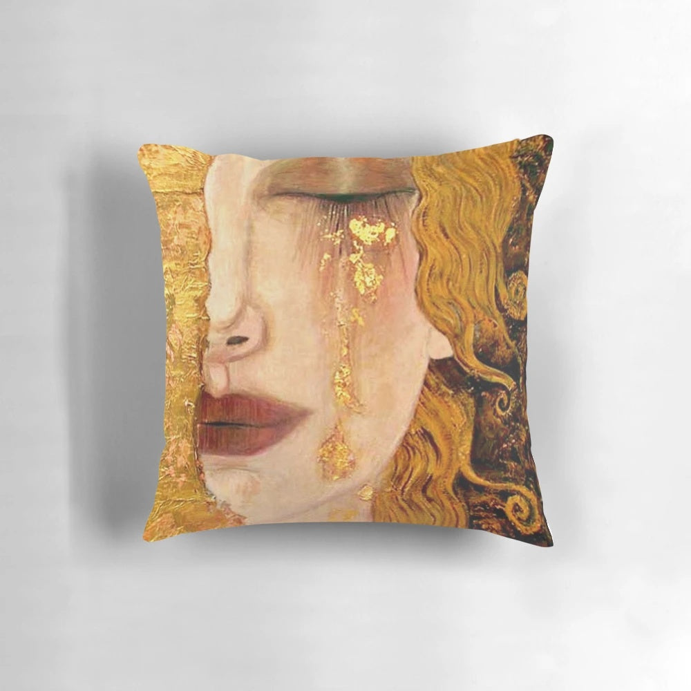 Pillow featuring Gustav Klimt's captivating "Golden Tears" painting of a redheaded woman in portrait.