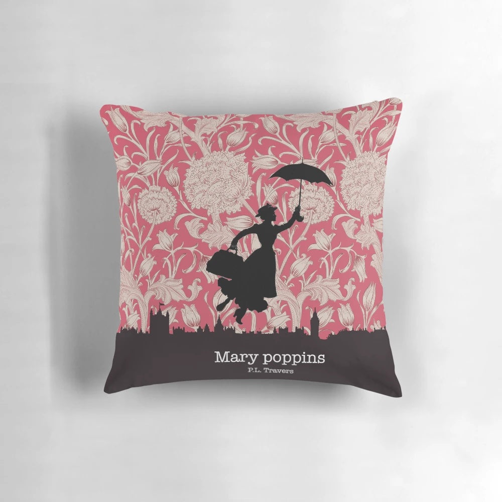 A decorative pillow featuring the silhouette of the iconic character Mary Poppins against a London skyline and floral pattern.