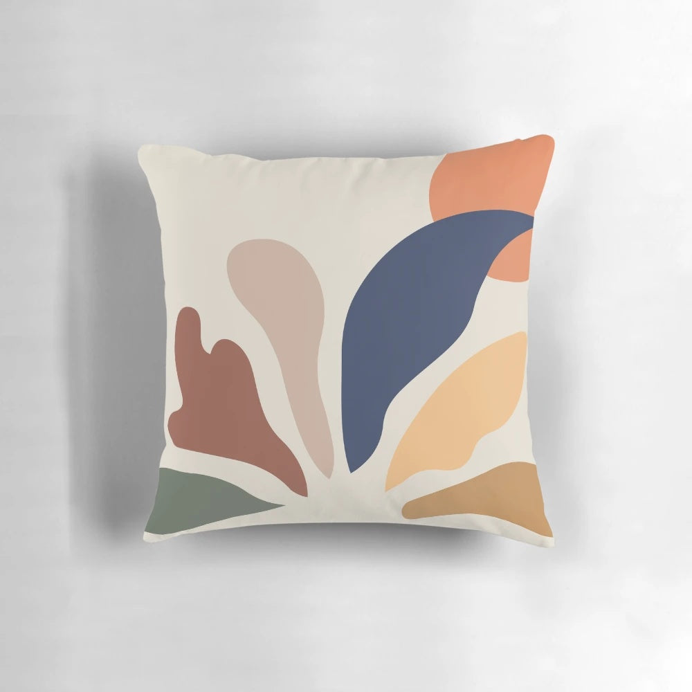 Vibrant throw pillow featuring the iconic Acanthus leaf cutout designs of famous artist Henri Matisse