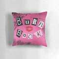 A decorative pillow featuring the iconic "Burn Book" from the classic comedy movie "Mean Girls"