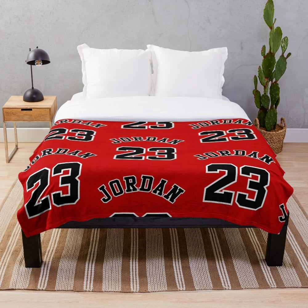 Michael Jordan inspired plush blanket featuring basketball, sports, and Chicago Bulls design