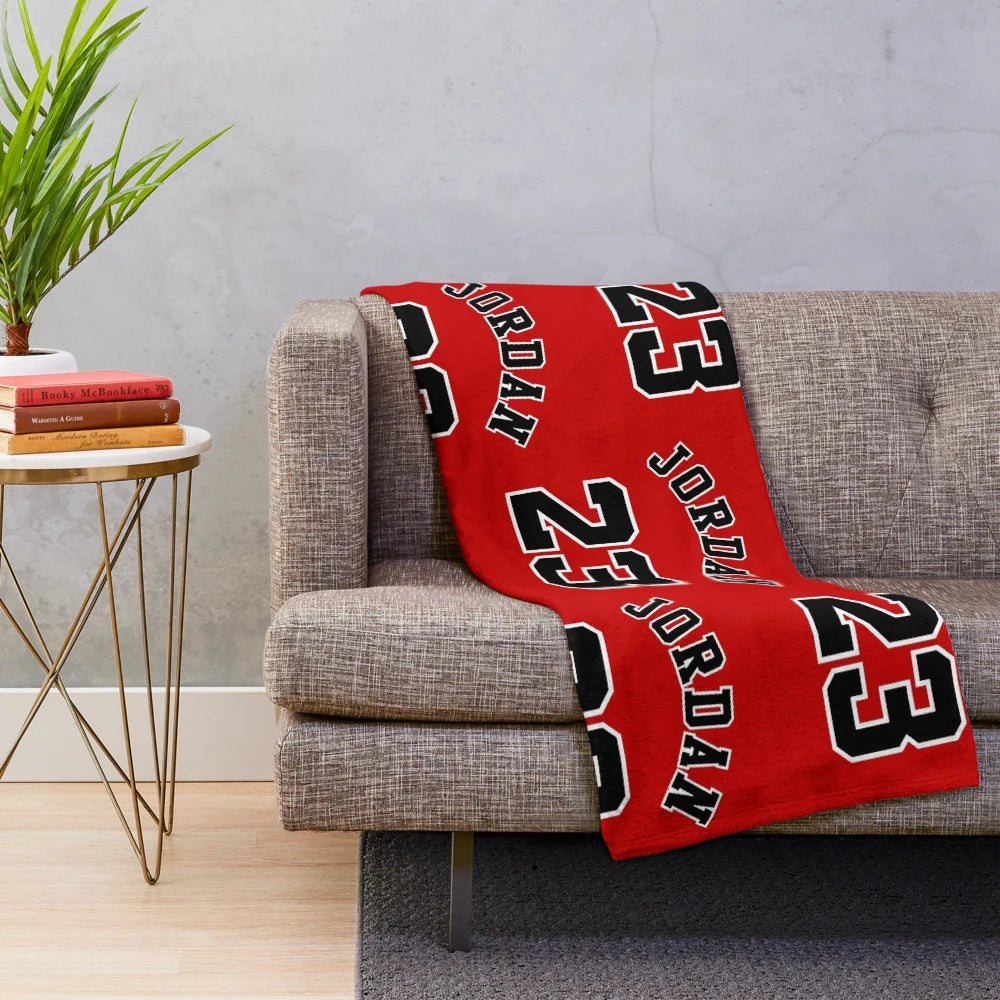 Michael Jordan inspired plush blanket featuring basketball, sports, and Chicago Bulls design