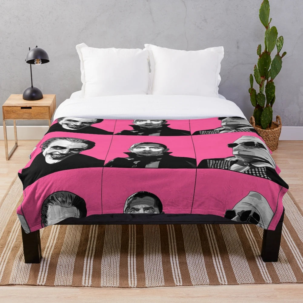 Plush blanket featuring classic movie monsters like Dracula and the Invisible Man in a retro black and white pop art style
