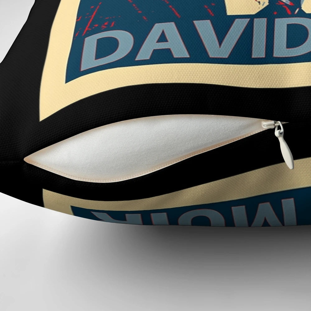 A plush pillow featuring the image of renowned American journalist and news anchor David Muir.