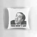 An image of a Nicolas Cage meme printed on a pillow