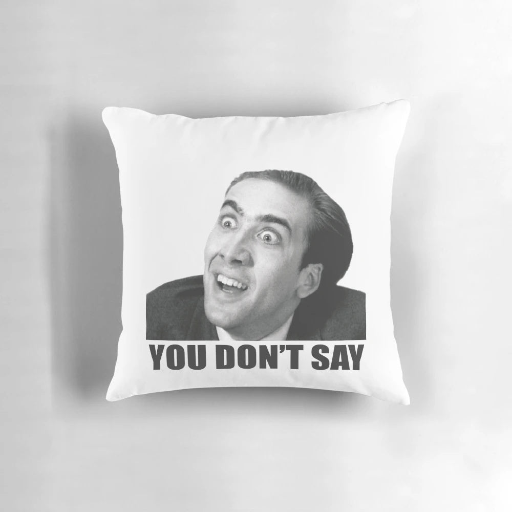 An image of a Nicolas Cage meme printed on a pillow