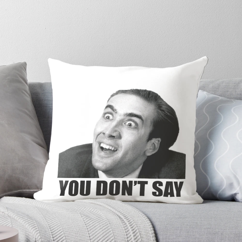 An image of a Nicolas Cage meme printed on a pillow