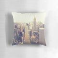 A plush, high-quality pillow featuring the iconic skyline of New York City, including the Empire State Building.