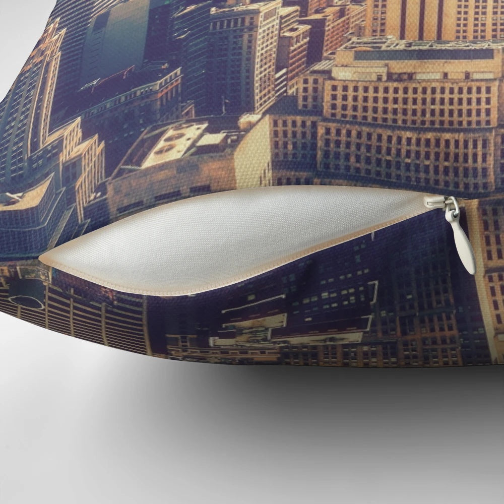 A plush, high-quality pillow featuring the iconic skyline of New York City, including the Empire State Building.