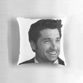 Patrick Dempsey's captivating black and white portrait on a soft, plush pillow for stylish home accents.