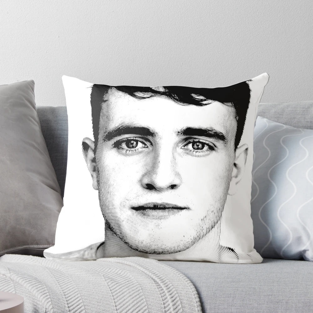 A black and white linocut portrait of actor Paul Mescal printed on a decorative pillow.